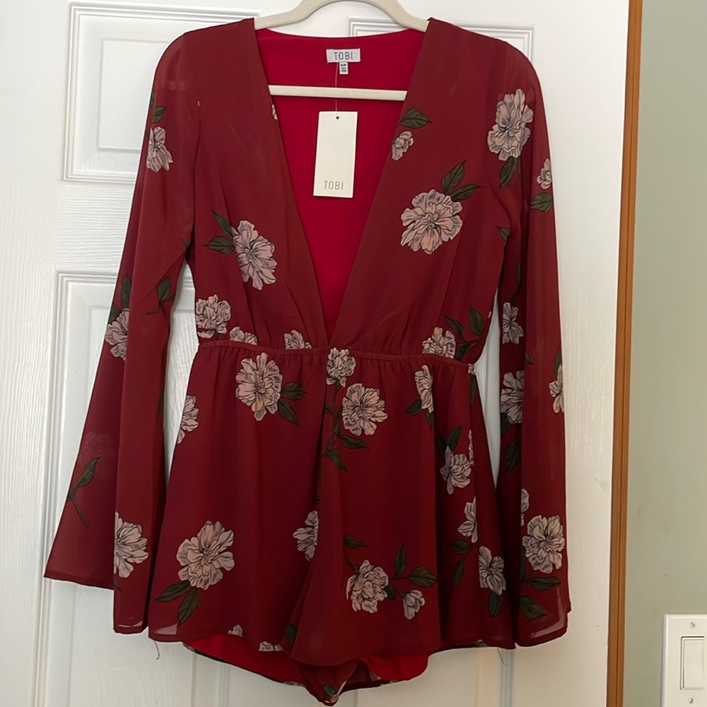 Fully lined bell-sleeved romper